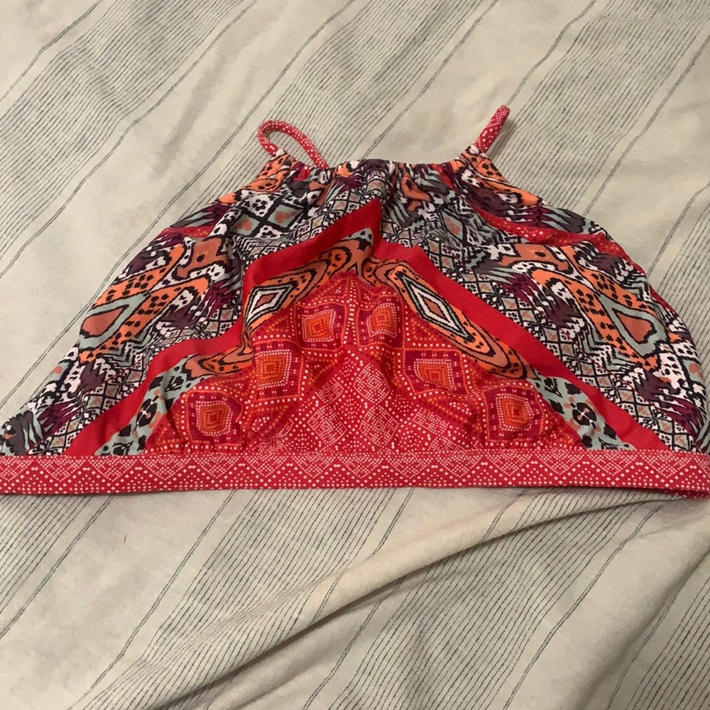 High knock bathing suit top is an XL but fits more like a medium